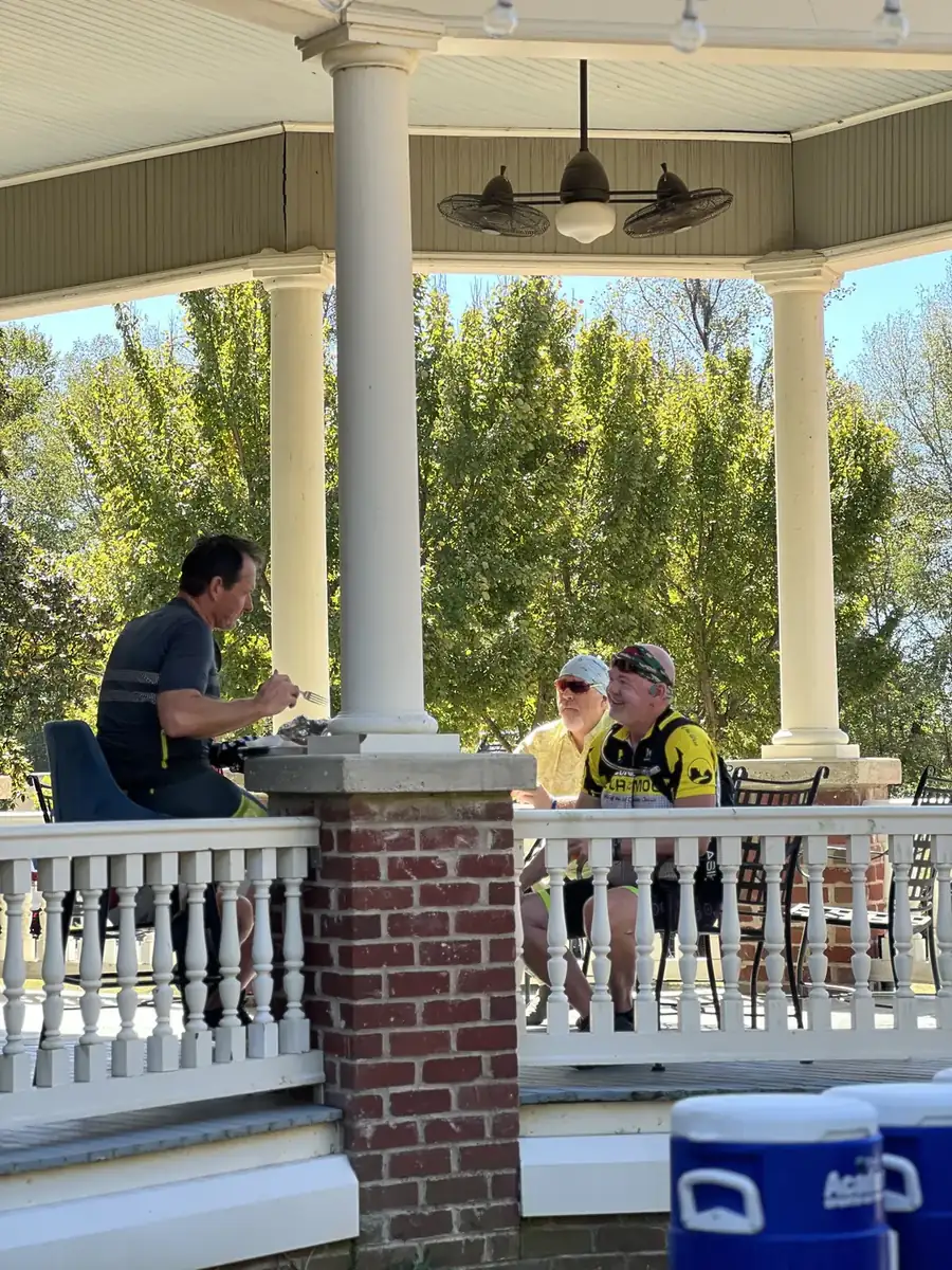 Riders sharing a meal at the Smith family's farm in Birdeye